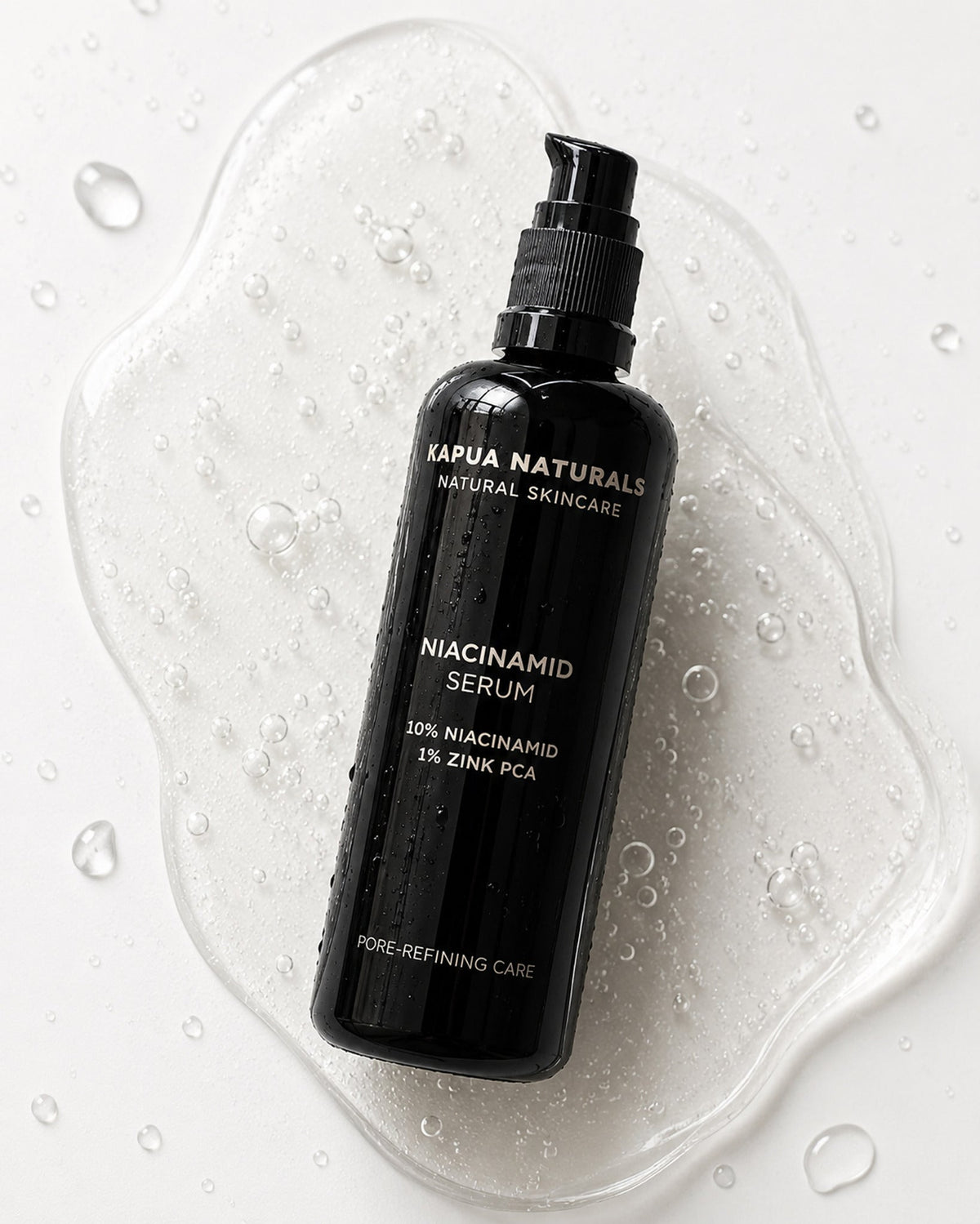 Kapua Naturals BIO Niacinamid Serum auf transparenter Geltextur